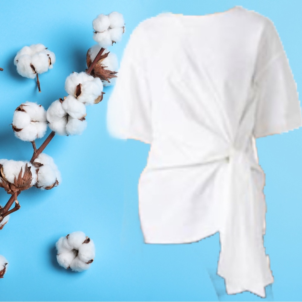 CAARA Mesorole Knotted Blouse